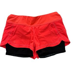 Athleta XS Athletic Workout Shorts Bright Pink Lined with black biker shorts